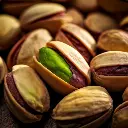Firefly An extreme close-up shot of unsalted pistachios, highlighting their natural surface texture,.webp